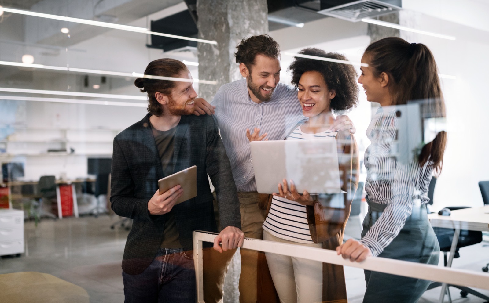 A legal support team collaborating in a modern office